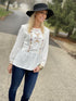 Ivory Embroidered Peplum Top